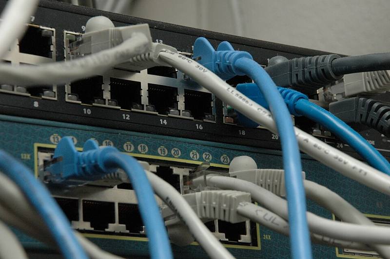 Stacked network switches with patch cables